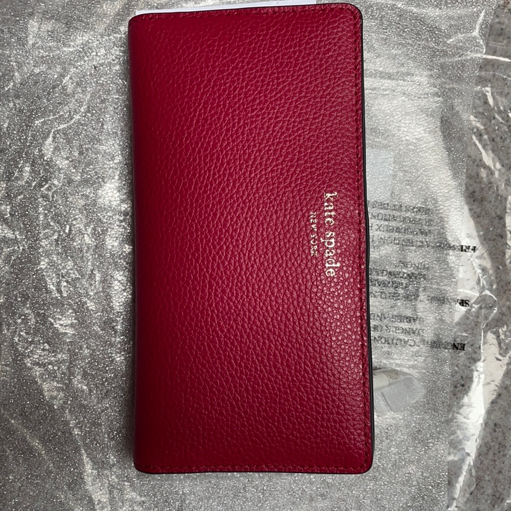 Kate Spade Red Cake wallet with zippered compartment and two rows for cards
